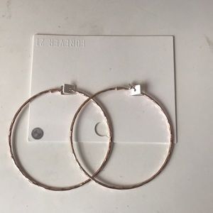 Really big rose gold hoops